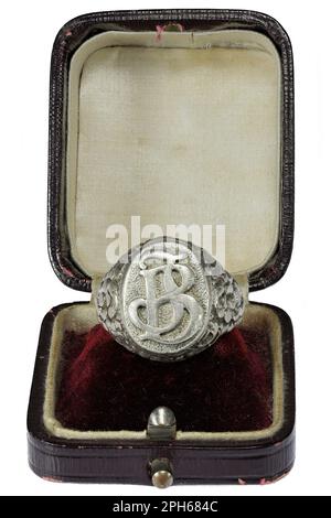 antique silver seal ring in vintage ring box isolated on white background Stock Photo