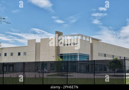 Houston, Texas USA 03-19-2023: Emser Tile building warehouse exterior in Houston, TX behind perimeter fence. Tiling manufacturer founded in 1968. Stock Photo