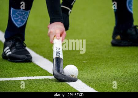 Nijmegen, Netherlands. 26th Mar, 2023. NIJMEGEN, NETHERLANDS - MARCH 26: Hockey player hitting the ball during the Promotieklasse Hockey match between NMHC Nijmegen H1 and LMHC Laren H1 at the Sportpark d'Almarasweg on March 26, 2023 in Nijmegen, Netherlands (Photo by John Beckmann/Orange Pictures) Credit: Orange Pics BV/Alamy Live News Stock Photo