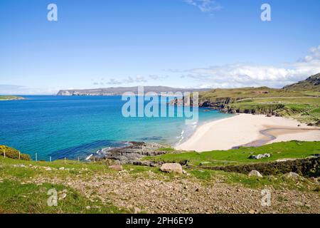 Looking over Sangobeg beach, Durness, North Coast, Sutherland, across calm blue sea to Whiten Head, in the distance,on the far side of Loch Eriboll. Stock Photo