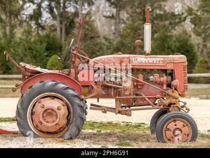 Profile of a 1956 Farmall farm tractor Stock Photo