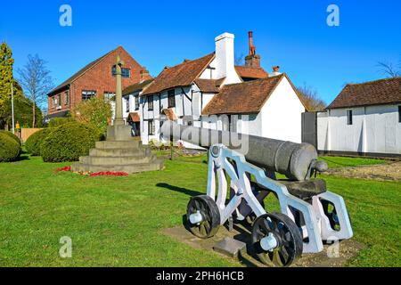 Chobham Cannon and Cottage, The High Street, Chobham, Surrey, England, United Kingdom Stock Photo