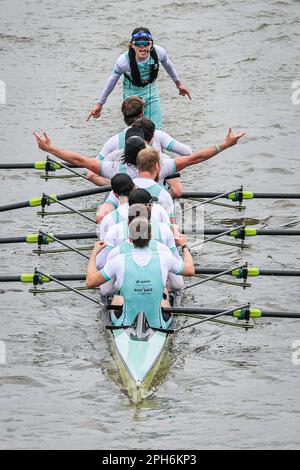 Boat Race 2023. Cambridge rowers after crossing the finish line at ...