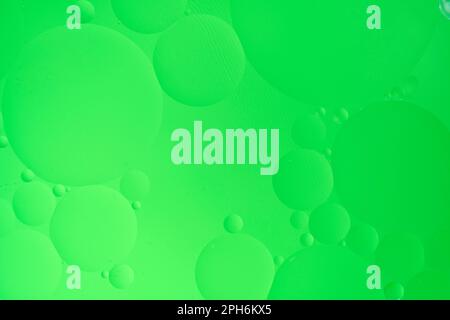 Abstract background with green oil circles and gradient. Stock Photo
