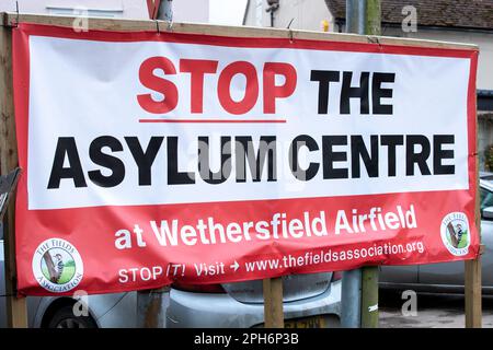 Braintree, UK. 26th Mar, 2023. 26th March 2023, A banner that says 'Stop The Asylum Centre' in Wethersfield, Braintree, Essex, MDP Wethersfield, a former RAF base is in talks to become accommodation for asylum seekers. There has been reports of the government to start using army bases and disused ferries to house migrants. Credit: Lucy North/Alamy Live News Stock Photo