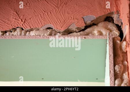 View of the wall is sheathed with moisture-resistant green plasterboard in the ...