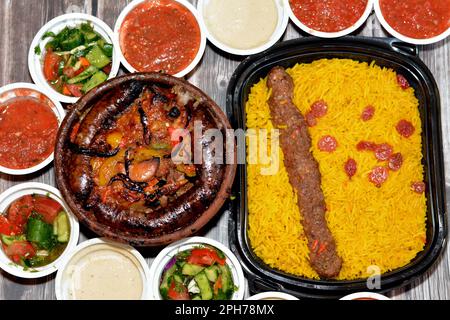 Traditional Egypt beef  Kofta, kebab and tarb kofta shish with mixture of lamb meat, sausage mumbar intestines filled with rice, kawareh trotters cow Stock Photo