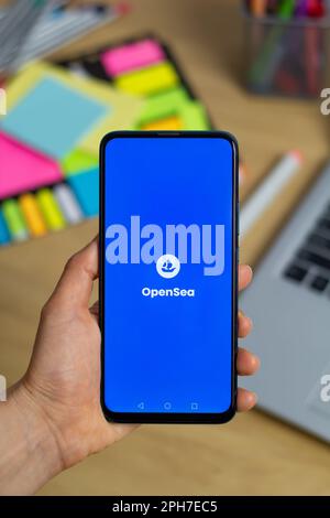 Kyiv, Ukraine - Mar. 20th, 2023: OpenSea logo on a mobile phone screen. Stock Photo