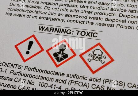 Warning on a Safety Data Sheet indicating that the product contains toxic substances. Standard chemical hazard pictograms are shown Stock Photo
