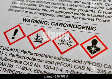 Warning on a Safety Data Sheet indicating that the product contains carcinogenic substances. Standard chemical hazard pictograms are shown Stock Photo