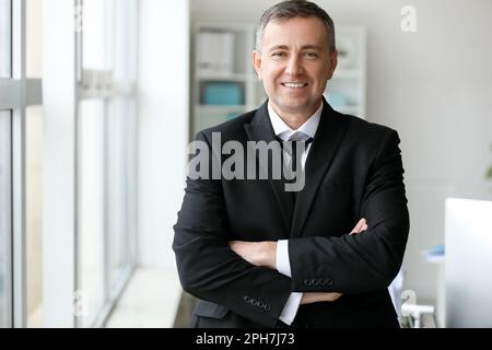 Mature accountant working in office Stock Photo