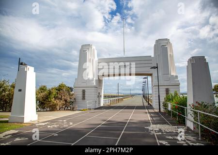 View of the Art Deco concrete abutment portal arch which frame the north end of the Hornibrook Bridge, in Clontarf, Redcliffe Peninsula, Australia Stock Photo