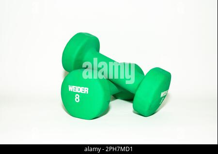 A pair of 8 pound green Weider hand weights isolated on a white background Stock Photo