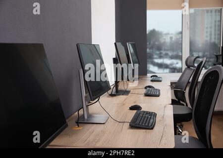 Many modern computers in open space office Stock Photo