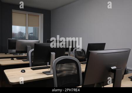 Many modern computers in open space office Stock Photo