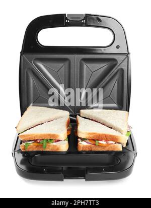 Modern grill maker with sandwiches on white background Stock Photo