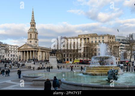 London, UK - February 27, 2023; View across Trafalgar Square and St Martin in the Fields church Stock Photo