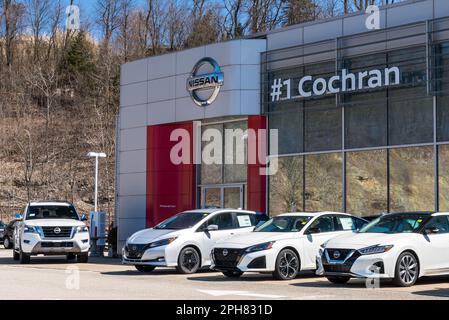 New Nissan vehicles in front of the #1 Cochran dealership in Wilkins Township, Pennsylvania, USA Stock Photo