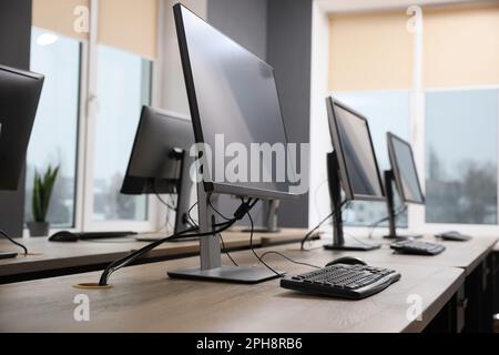 Many modern computers in open space office Stock Photo