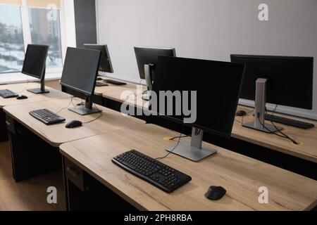 Many modern computers in open space office Stock Photo