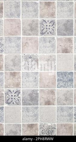 ancient tile old wall from colorful ceramic square tiles for floor background Stock Photo