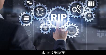 RIP. Businessman pressing virtual screen Routing Information Protocol. Technology networks concept. Stock Photo