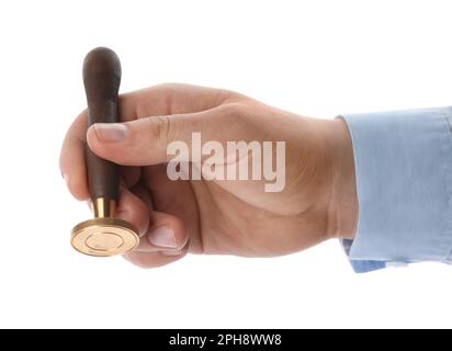 Man holding wooden stamp on white background, closeup Stock Photo