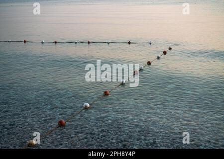 Calm on sea in early morning at sunrise, close-up, tourist concept of vacation by the sea Stock Photo