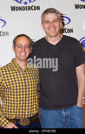Elliot Kalan, Eric Koenig arrive at the press room for'Housebroken' during Day 2 of the 2023 WonderCon convention at the Anaheim Convention Center on
