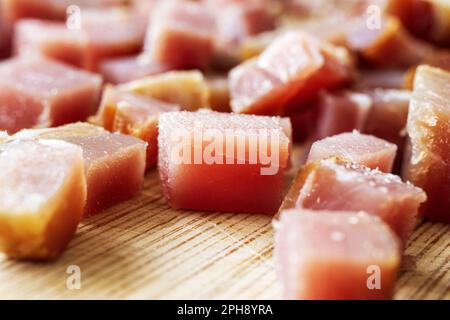 Smoked meat cut into cubes. Stock Photo