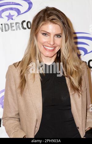 Caitlin Bassett arrives at the press room for "Quantum Leap" during Day