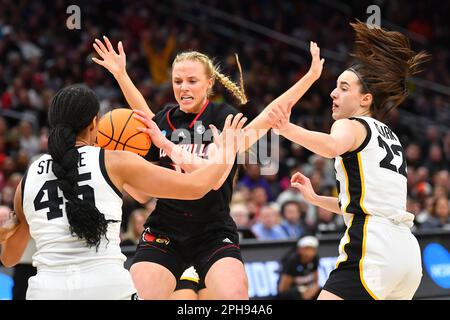 March 26, 2023: Louisville Cardinals guard Hailey Van Lith (10) in traffic as Iowa Hawkeyes forward Hannah Stuelke (45) and guard Caitlin Clark (22) work on defense during the NCAA women's NCAA Regional Final basketball game between Louisville and Iowa at Climate Pledge Arena in Seattle, WA. Iowa defeated Louisville 97-83 to advance to the Final 4. Steve Faber/CSM Stock Photo