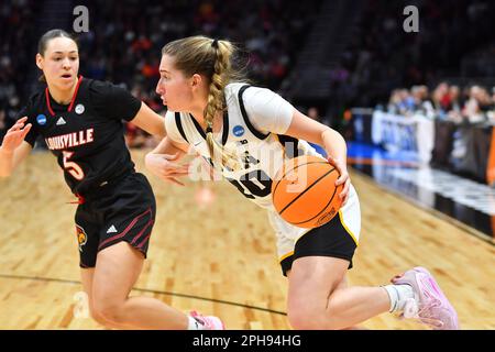 March 26, 2023: Iowa Hawkeyes guard Kate Martin (20) drives the baseline during the NCAA women's NCAA Regional Final basketball game between Louisville and Iowa at Climate Pledge Arena in Seattle, WA. Iowa defeated Louisville 97-83 to advance to the Final 4. Steve Faber/CSM Stock Photo