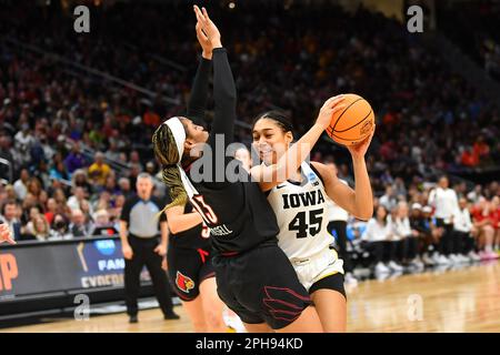 March 26, 2023: Iowa Hawkeyes forward Hannah Stuelke (45) works inside against Louisville Cardinals guard Merissah Russell (13) during the NCAA women's NCAA Regional Final basketball game between Louisville and Iowa at Climate Pledge Arena in Seattle, WA. Iowa defeated Louisville 97-83 to advance to the Final 4. Steve Faber/CSM Stock Photo