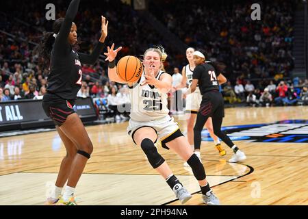 March 26, 2023: Iowa Hawkeyes forward Monika Czinano (25) chases a loose ball near the basket during the NCAA women's NCAA Regional Final basketball game between Louisville and Iowa at Climate Pledge Arena in Seattle, WA. Iowa defeated Louisville 97-83 to advance to the Final 4. Steve Faber/CSM Stock Photo