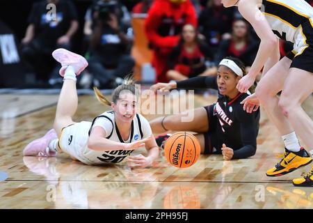 March 26, 2023: Iowa Hawkeyes guard Kate Martin (20) dives for a loose ball during the NCAA women's NCAA Regional Final basketball game between Louisville and Iowa at Climate Pledge Arena in Seattle, WA. Iowa defeated Louisville 97-83 to advance to the Final 4. Steve Faber/CSM Stock Photo