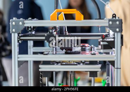 3d printer printing objects closeup. Modern technical 3D printing. Stock Photo
