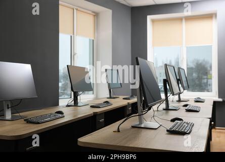 Many modern computers in open space office Stock Photo