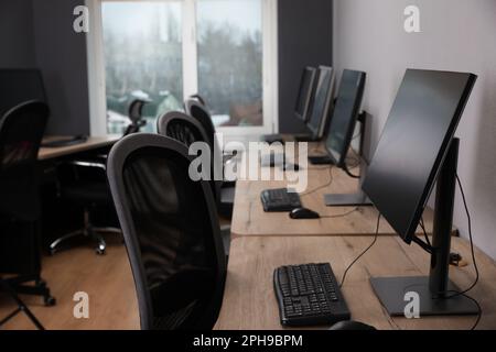 Many modern computers in open space office Stock Photo