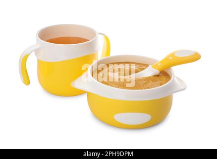 Healthy baby food in bowl and bottle with drink on white background Stock Photo