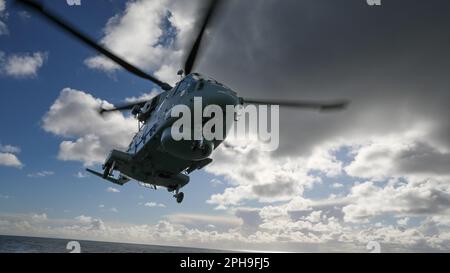 Royal Navy Merlin Military Helicopter With Folded Tail And Rotor On The ...