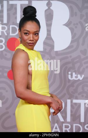 Naomi Ackie photographed attending The BRITS Red Carpet Arrivals at The