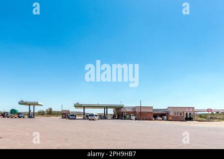 Groblershoop, South Africa - Feb 24, 2023: A gas station, tyre shop and restaurant, in Groblershoop in the Northern Cape Province Stock Photo