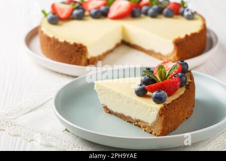 Classical New York Cheesecake With Slice Cut Out. Closeup View. Horizontal Stock Photo