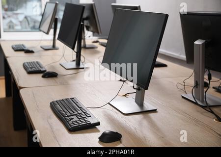 Many modern computers in open space office Stock Photo