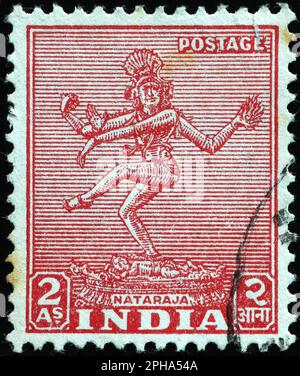 Hindu deity on vintage indian postage stamp Stock Photo