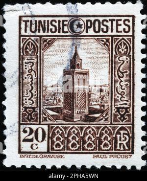 Minaret on old tunisian postage stamp Stock Photo