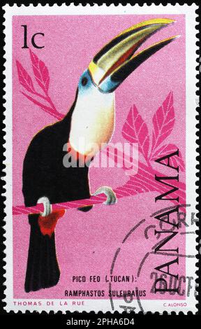 Perched toucan on postage stamp of Panama Stock Photo