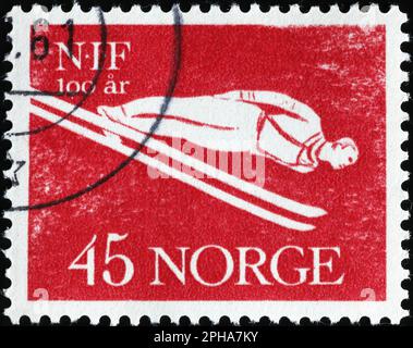 Ski jumper on old norwegian postage stamp Stock Photo