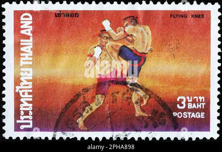 Traditional thai combat on postage stamp from Thailand Stock Photo